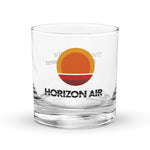 Glass tumbler with horizon air logo